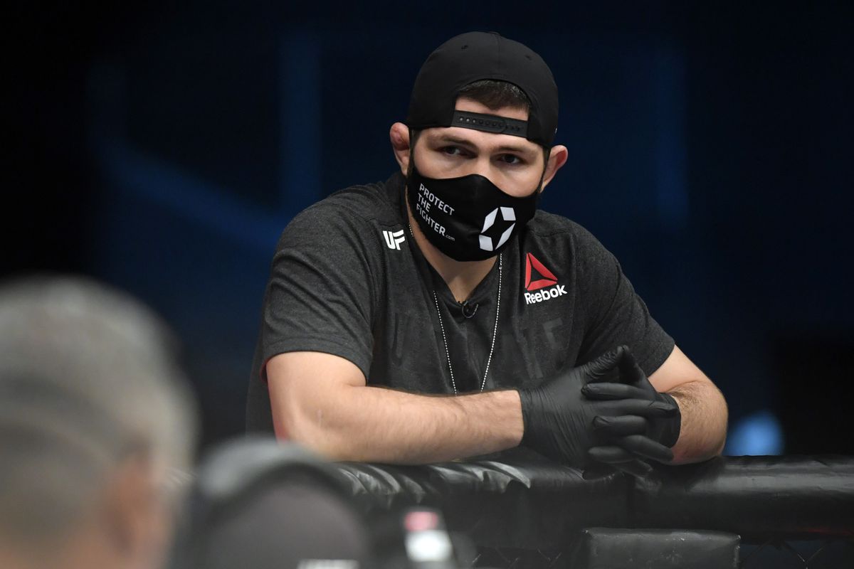 Why was khabib removed from plane